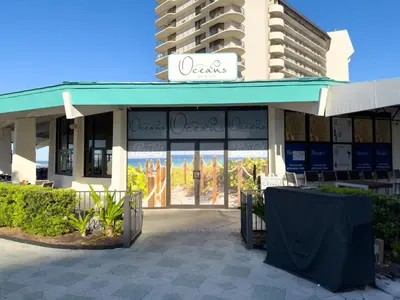 a store front of a building with a sign on it at Edgewater 3-0814 'Pelican Watch' in Panama City Beach