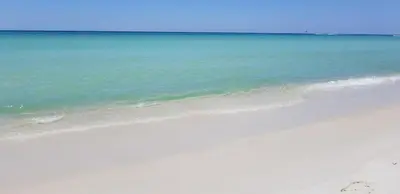 a view of a beach with the ocean at Mariner West 605 'Flip Flops & Sunsets' in Panama City Beach
