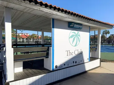 a sign for the club at a tennis court at Edgewater Villa 3011 'Fountain View Hideaway' in Panama City Beach