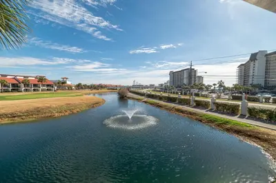 a river with a fountain in the middle at Edgewater Villa 3111 'The Salty Oasis' in Panama City Beach