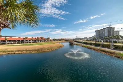 a river with a fountain in the middle of it at Edgewater Villa 3111 'The Salty Oasis' in Panama City Beach
