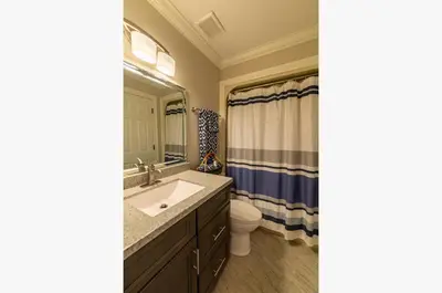 a bathroom with a sink and a toilet at Edgewater Villa 1510 'Beach & Golf' in Panama City Beach