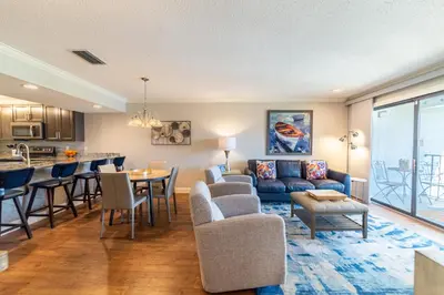 a living room with a couch and a table at Edgewater Villa 1510 'Beach & Golf' in Panama City Beach