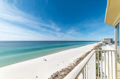 a view of the beach from the balcony of a condo at Boardwalk 1409 'Emerald Ray' in Panama City Beach
