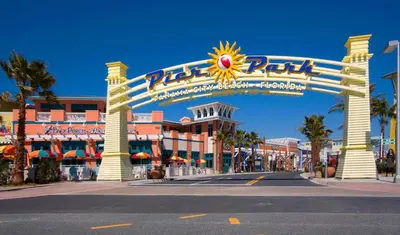 an entrance to a resort with a large sign at Boardwalk 1409 'Emerald Ray' in Panama City Beach