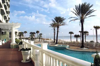 a view of the beach from the balcony of a resort at Boardwalk 0810 'Endless Summer' in Panama City Beach