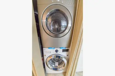 a washer and dryer in a room at Dunes of Panama E1703 'After-Dune Delight' in Panama City Beach