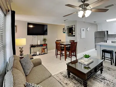a living room with a couch and a table at Horizon South #57-203 in Panama City Beach