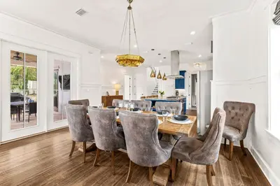 a dining room with a table and chairs at 30Yay! by 30A Escapes in Watersound Beach