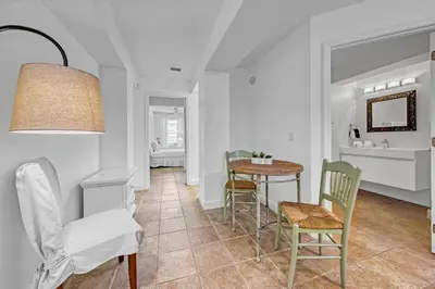 a kitchen and dining room with a table and chairs at Ocean Front Property in Seacrest