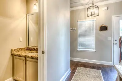 a bathroom with a shower and a sink at Here & Now in Inlet Beach