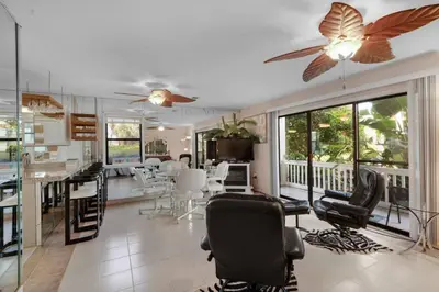 a living room with a kitchen and a dining room at Beachwood Villas 7G in Santa Rosa Beach