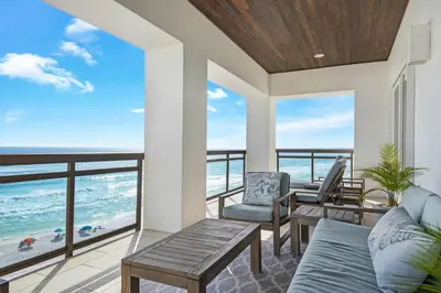 a living room with a view of the ocean at The Penthouse at Seagrove in Santa Rosa Beach