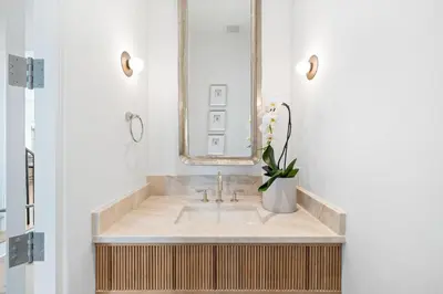 a bathroom with a sink and a mirror at Del mar 30A in Seacrest