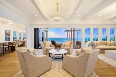 a living room with a view of the ocean at Del mar 30A in Seacrest