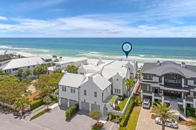 an aerial view of a house with a clock tower at Devonshire West in Seacrest