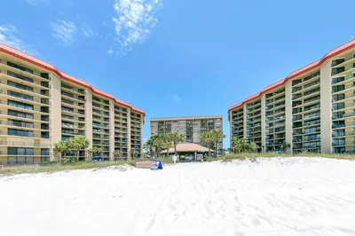 a view of two large buildings on the beach at Summerhouse 1012C in Panama City Beach