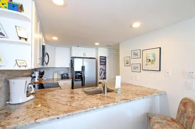 a kitchen with a counter top with a sink at One Seagrove Place 0605 in Santa Rosa Beach