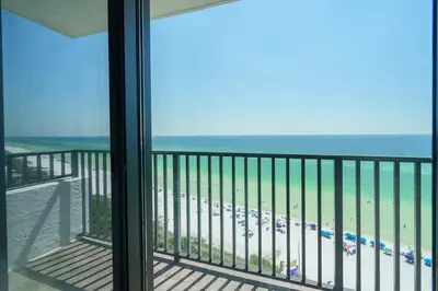 a balcony with a view of the beach and the ocean at One Seagrove Place 1101 in Santa Rosa Beach