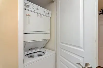 a white washer and dryer in a kitchen at One Seagrove Place 1007 in Santa Rosa Beach