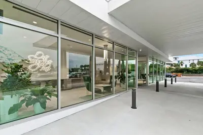 a large glass building with a lot of windows at One Seagrove Place 0804 in Santa Rosa Beach