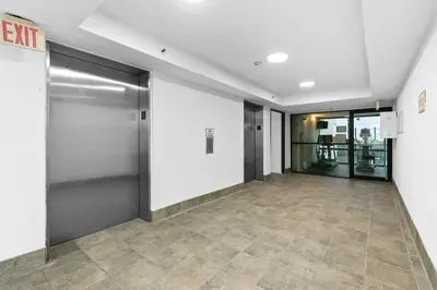 an empty hallway with a elevator in a building at One Seagrove Place 1406 in Santa Rosa Beach