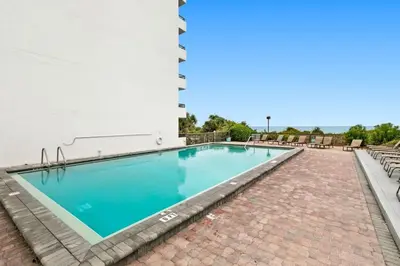 a swimming pool on top of a building at One Seagrove Place 1408 in Santa Rosa Beach
