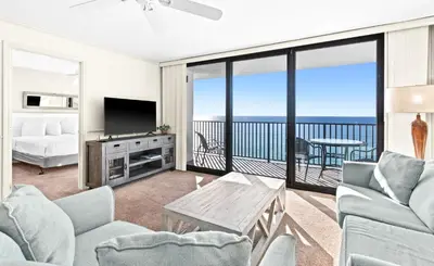 a living room with a view of the ocean at One Seagrove Place 1208 in Santa Rosa Beach