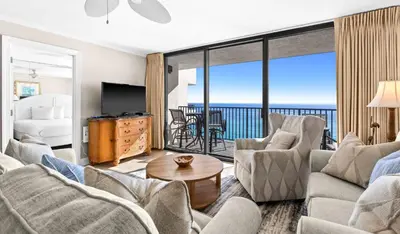 a living room with a view of the ocean at One Seagrove Place 1303 in Santa Rosa Beach