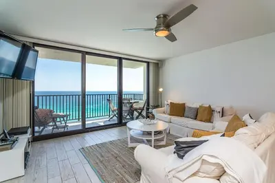 a living room with a view of the ocean at One Seagrove Place 1302 in Santa Rosa Beach