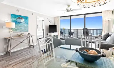 a living room with a view of the ocean at One Seagrove Place 0403 in Santa Rosa Beach
