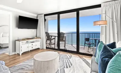 a living room with a view of the ocean at One Seagrove Place 1008 in Santa Rosa Beach