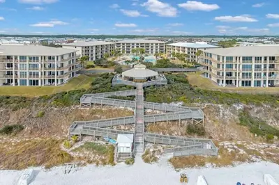 an aerial view of a resort on the beach at High Pointe Resort 131 in Inlet Beach
