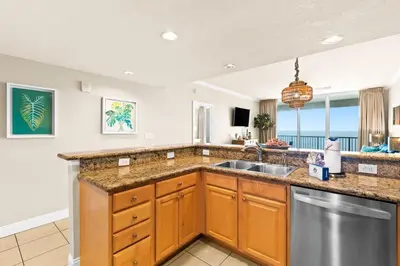 a kitchen with a sink and a dishwasher at Palazzo 0507 in Panama City Beach