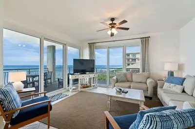 a living room with a view of the ocean at High Pointe Resort E26 in Inlet Beach