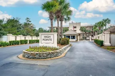 a high promise sign in the middle of a road at High Pointe Resort E26 in Inlet Beach