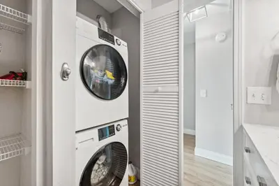 a laundry room with a washer and dryer at Coastal Retreat by the Beach in Panama City Beach