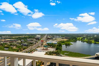 a view of a river from a balcony at Laketown Wharf #1433 in Panama City Beach