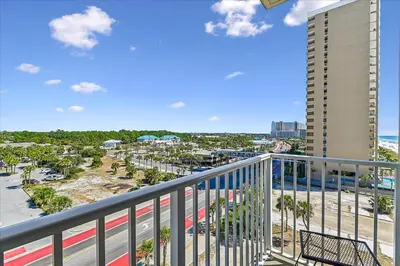 a balcony with a view of a parking lot at 601 Grandview East in Panama City Beach