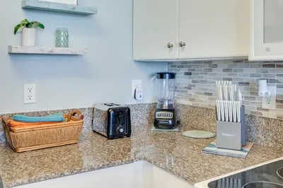 a kitchen counter with a toaster and a blender on it at 930 Shores Of Panama in Panama City Beach