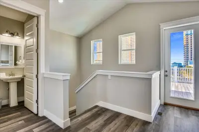 a room with a staircase and a window at A Shore Thing- A in Panama City Beach