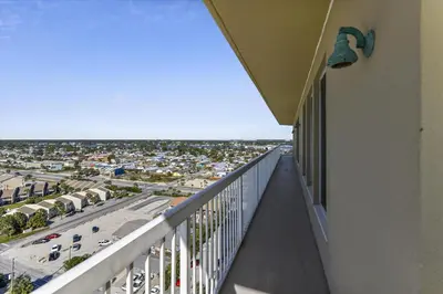a balcony with a view of a parking lot at 1409-Seychelles in Panama City Beach