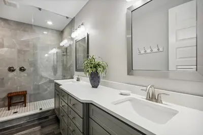 a bathroom with a sink and a shower at Starfish Shores in Panama City Beach