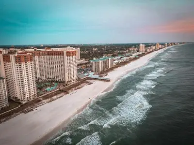 an aerial view of a beach with buildings and the ocean at 225-Shores Of Panama in Panama City Beach