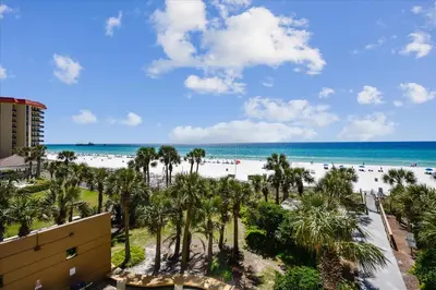 a view of the beach from the balcony of a resort at 1504 Sterling Beach in Panama City Beach