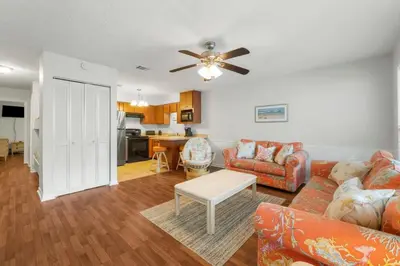 a living room with a couch and a table at Southwinds Unit D3 in Panama City Beach
