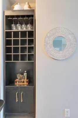 a door leading into a kitchen with a shelf at Newly Renovated Luxury OCEAN FRONT Condo! Top Floor Condo with PENTHOUSE OCEAN VIEWS! in Panama City Beach