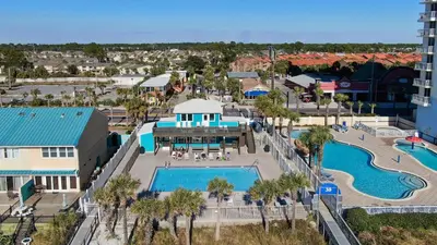 an aerial view of a pool at a resort at Gulf Highlands #175 by Nautical Properties in Panama City Beach