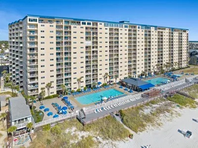 an aerial view of a resort with a pool and beach at Deep Savings While Regency Updates Oct-March in Panama City Beach