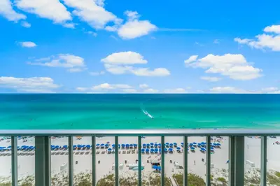 a view of the beach from the balcony of a resort at Deep Savings While Regency Updates Oct-March in Panama City Beach